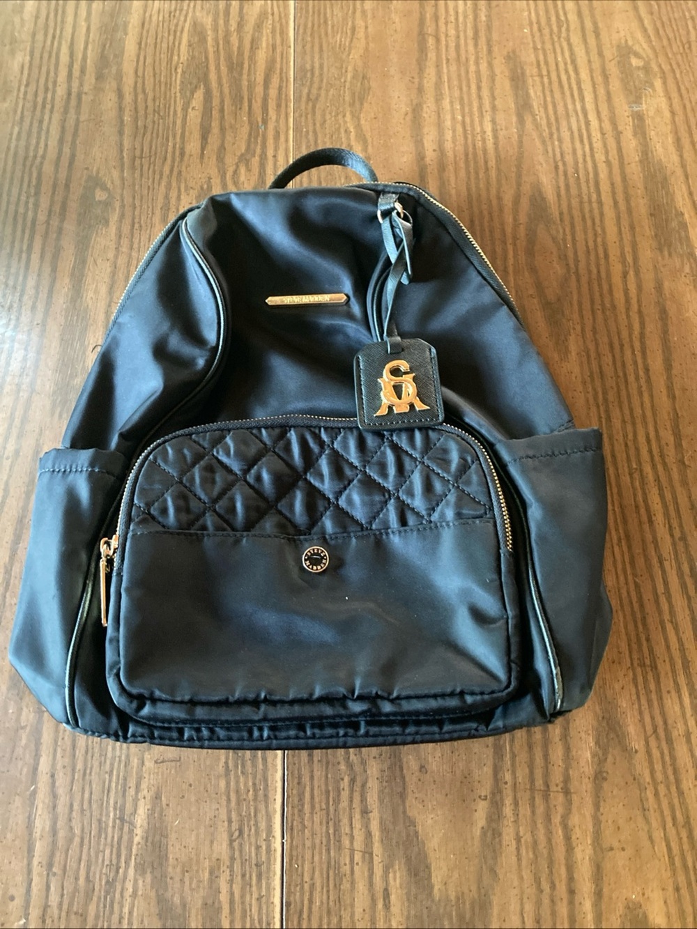 Steve Madden sm Black Quilted Front Pocket Backpack with Gold Hardware